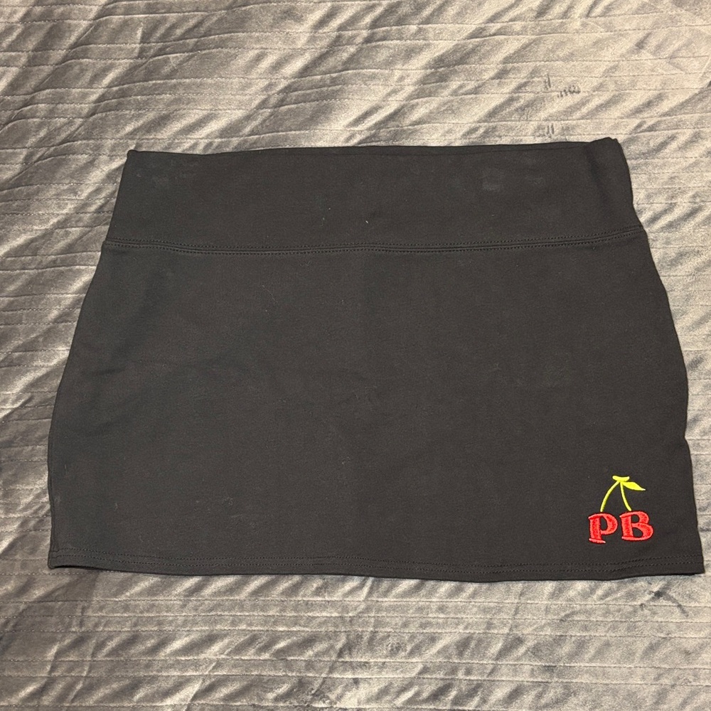 PLAYBOY Black Mini Skirt with Red and Yellow Logo